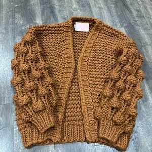 Cable knit cardigan with bubble sleeves